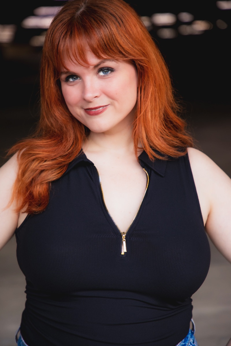 Blaire Erskine in a black top, editorial portrait.
